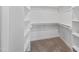 Walk-in closet with shelving, providing ample storage space at 2142 Henderson Tanyard Rd, Pittsboro, NC 27312