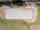 Aerial view of an equestrian arena, ready for riding and training at 2142 Henderson Tanyard Rd, Pittsboro, NC 27312