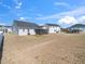 Large backyard with a screen porch, perfect for outdoor living and recreation at 217 Mallard Loop Dr, Clayton, NC 27527