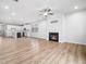 Open floor plan shows living room with fireplace and direct access to kitchen at 217 Mallard Loop Dr, Clayton, NC 27527