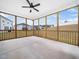 Covered outdoor patio with a ceiling fan and view of neighboring houses at 217 Mallard Loop Dr, Clayton, NC 27527