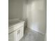 Half bathroom featuring white vanity with storage and bright lighting at 226 Rolling Pasture Way, Sanford, NC 27332