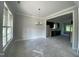 Dining room with elegant chandelier and view of the kitchen, perfect for entertaining guests at 226 Rolling Pasture Way, Sanford, NC 27332