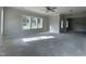 Spacious living room featuring large windows, ceiling fan, and ample natural light at 226 Rolling Pasture Way, Sanford, NC 27332