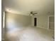 A large main bedroom has great light and a ceiling fan at 226 Rolling Pasture Way, Sanford, NC 27332