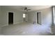 The main bedroom boasts multiple doorways and a ceiling fan at 226 Rolling Pasture Way, Sanford, NC 27332