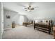 Spacious bedroom with two beds, carpet, ceiling fan and a window that provides natural light at 236 Star Valley Dr, Angier, NC 27501