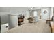 Large bonus room with plush carpet, a floral sofa, and entertainment area at 236 Star Valley Dr, Angier, NC 27501