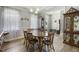 Dining room with wood floors, wainscoting, and chandelier at 236 Star Valley Dr, Angier, NC 27501