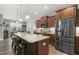 Stylish kitchen featuring stainless steel appliances, and a center island with seating at 236 Star Valley Dr, Angier, NC 27501