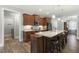 Modern kitchen featuring granite countertops, stainless steel appliances, and hardwood floors at 236 Star Valley Dr, Angier, NC 27501