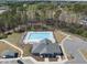 Aerial view of a community pool, surrounded by seating and greenery at 239 Hopper Cir, Clayton, NC 27520