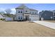 Beautiful home with a two-car garage, well-kept lawn, and a classic facade at 239 Hopper Cir, Clayton, NC 27520