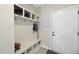 Well-organized mudroom with built-in bench, hooks, and storage cubbies, perfect for keeping essentials tidy at 239 Hopper Cir, Clayton, NC 27520