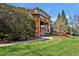 The home’s spacious backyard is perfect for entertaining with mature landscaping at 2550 Bittersweet Dr, Durham, NC 27705
