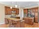 Well-equipped kitchen with stainless steel appliances and a large kitchen island with seating at 2550 Bittersweet Dr, Durham, NC 27705
