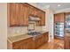 A kitchen featuring stainless appliances, custom cabinets and tile countertops and backsplash at 2550 Bittersweet Dr, Durham, NC 27705