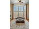 Spacious living room with a large bay window, providing abundant light and backyard views at 2550 Bittersweet Dr, Durham, NC 27705