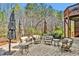 Charming outdoor patio with multiple seating areas, perfect for relaxing and entertaining guests at 2550 Bittersweet Dr, Durham, NC 27705