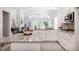 Well-appointed kitchen with a large island, granite counters, modern appliances, and an open layout at 262 Cardovia Way, Wendell, NC 27591