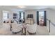 Upstairs loft area with white walls, carpeted floor, and an area for office, tv, games, and relaxing at 262 Cardovia Way, Wendell, NC 27591