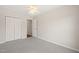 Bedroom featuring a closet, carpet flooring and neutral paint at 2621 Wellington Ridge Loop, Cary, NC 27518