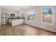 Kitchen with stainless steel appliances, bright lighting, and an open design at 2621 Wellington Ridge Loop, Cary, NC 27518