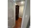 Spacious closet with custom shelving and hardwood floors, offering ample storage and organization at 2820 Mattlyn Ct, Raleigh, NC 27613
