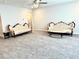 Spacious living room with carpet, vintage sofas, and a decorative chandelier at 2918 Balbardie Dr, Apex, NC 27502