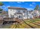 Charming two-story home featuring a spacious backyard and a wooden deck, perfect for outdoor living and entertaining at 3 Guilder Cv, Durham, NC 27713