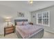 Cozy bedroom with a comfortable queen-sized bed, stylish nightstands, and soft, inviting decor at 3 Guilder Cv, Durham, NC 27713