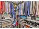 Organized walk-in closet providing ample storage with clothing racks, shelves, and drawers for efficient space utilization at 3 Guilder Cv, Durham, NC 27713