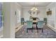 Formal dining room featuring a chandelier and a table with four chairs at 3 Guilder Cv, Durham, NC 27713