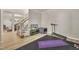A versatile bonus room currently used as a multi-purpose exercise and living space at 3 Guilder Cv, Durham, NC 27713