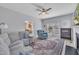 Bright living room with ceiling fan, stylish furniture, and view to kitchen enhancing the cozy atmosphere at 3 Guilder Cv, Durham, NC 27713