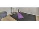 Dedicated work-out room with fitness equipment and padded flooring at 3 Guilder Cv, Durham, NC 27713