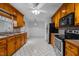 Functional kitchen with wood cabinets, modern appliances, and ample counter space at 315 Dumont Dr, Hillsborough, NC 27278