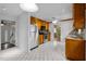 Traditional kitchen features wood cabinets, stainless steel appliances, and white tiled flooring at 315 Dumont Dr, Hillsborough, NC 27278