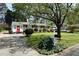 Lovely single-story home boasts a well-kept lawn, mature trees, and inviting curb appeal at 3516 Apache Dr, Raleigh, NC 27609