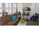 Cozy sunroom with wicker furniture, plantation shutters, and natural light at 3516 Apache Dr, Raleigh, NC 27609