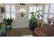 Bright sunroom featuring white trim, lots of windows, and a door with a star decoration at 3516 Apache Dr, Raleigh, NC 27609