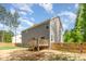 Backyard featuring a wooden deck and fenced-in yard, offering a blend of privacy and outdoor space at 40 Poplar Bark Dr, Youngsville, NC 27596