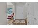 Bright foyer featuring a neutral color palette, wood flooring, and a staircase at 40 Poplar Bark Dr, Youngsville, NC 27596