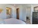 Bedroom showing en-suite bathroom and closet, with stylish furniture and tasteful decorations at 404 Deercroft Dr, Apex, NC 27539