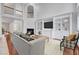 Open living room featuring high ceilings, built-in shelving, and a cozy fireplace at 404 Vintage Hill Cir, Apex, NC 27539