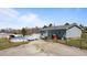 This backyard features an above ground pool, deck, gravel parking and fenced yard at 41 Rock Bluff Ln, Kittrell, NC 27544