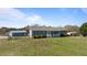 Lovely single-story home with a front porch and a detached garage at 41 Rock Bluff Ln, Kittrell, NC 27544