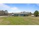 Inviting single-story home with a quaint front porch and a spacious front yard at 41 Rock Bluff Ln, Kittrell, NC 27544