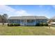 Charming single-story home featuring a cozy front porch and well-manicured lawn at 41 Rock Bluff Ln, Kittrell, NC 27544