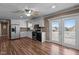 Spacious kitchen with white cabinets, stainless steel appliances and an access to the deck at 41 Rock Bluff Ln, Kittrell, NC 27544